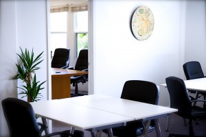 Front office shot with board room